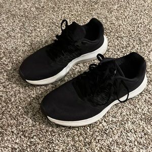 Black Nike running shoes